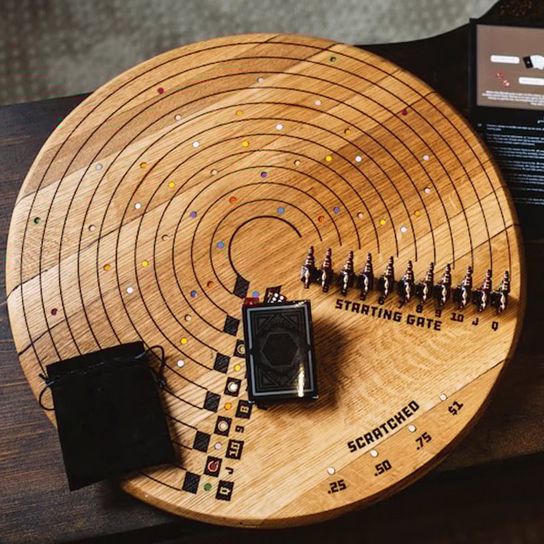 Scratched Horses Game made from a whiskey barrel